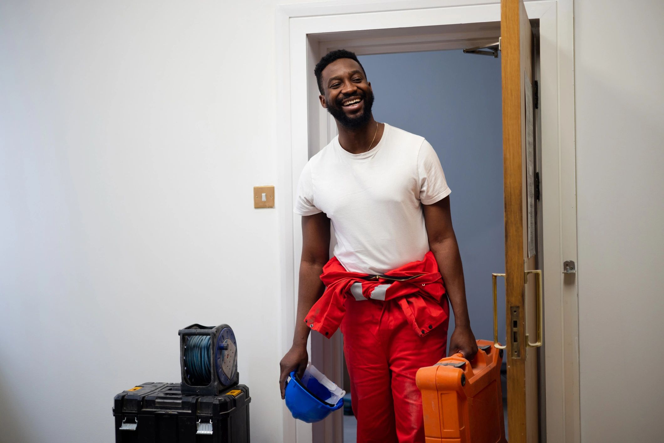 HVAC technician arriving ready for emergency service